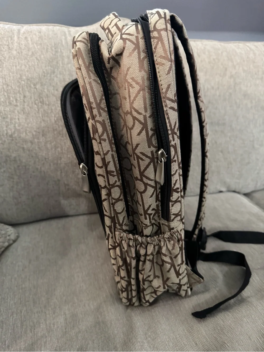 Calvin Klein Beige & Brown Monogram Backpack. Excellent condition.